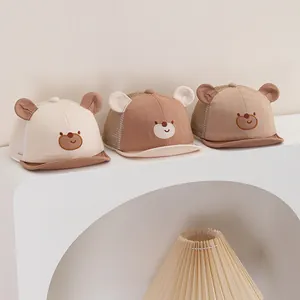 Three baby mesh baseball caps with bear embroidery and 3D ears in soft earthy tones