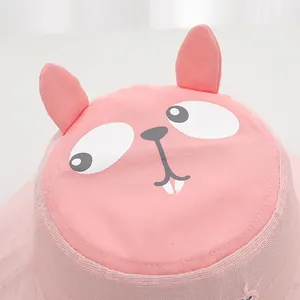 Close-up of pink sun hat with cartoon cat face, 3D ears and breathable mesh fabric