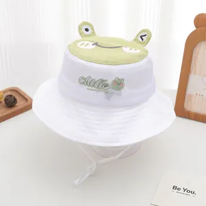 Detail of frog-themed sun hat with mesh side panels and adjustable chin strap