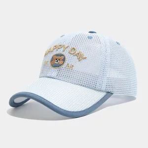Detailed view of breathable mesh and cartoon bear embroidery on kids baseball cap