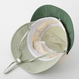 Detail view of quick-dry baby sun hat with adjustable strap and breathable lining