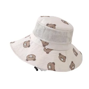 Kids breathable beige bucket hat with cartoon bear prints and adjustable chin strap