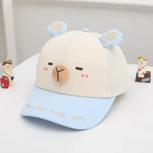 Detailed close-up of 3D bear ears and embroidery on children's mesh sun hat