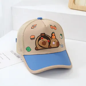 Detail view of khaki and blue breathable mesh kids' baseball cap with cartoon patches