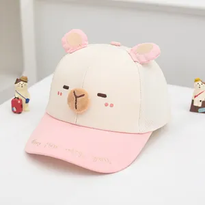 Close-up of the breathable mesh back and cartoon 3D ears on a kid's pink baseball cap