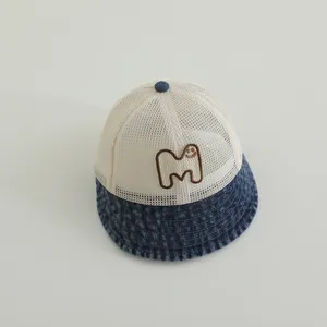 Baby mesh fisherman hat with denim brim and smiley M embroidery for summer sun protection