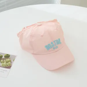 Detail of pink quick-dry baseball cap with blue BOSTON 1630 3D embroidery on the front