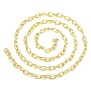Detailed view of golden textured oval link chain for DIY jewelry making and accessories