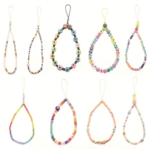 Colorful evil eye beaded phone charms with LOVE letters and smiling face accents