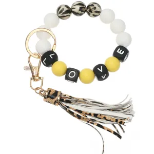 Handmade leopard print silicone bead keychain bracelet with LOVE letter charms and tassel