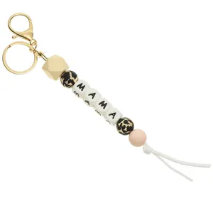 Minimalist silicone bead keychain with MAMA lettering, leopard print and pink beads