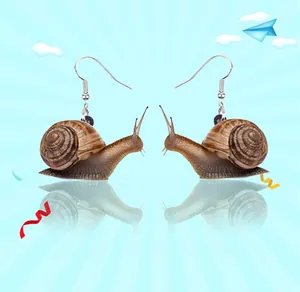 Detailed realistic snail acrylic earrings featuring brown shell patterns and silver hooks