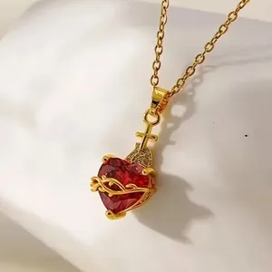 Gold stainless steel heart necklace with red gemstone pendant and cross charm