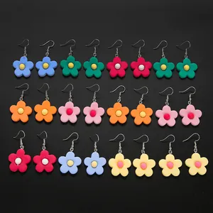 Set of 12 pairs of colorful flower earrings with matte resin petals and silver hooks
