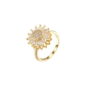 Rotating sunflower open ring in gold finish with sparkling cubic zirconia petals