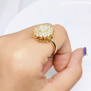 Adjustable gold sunflower ring with sparkling zircon petals and rotating flower head