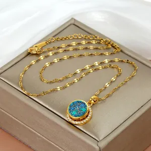 Golden Tree of Life necklace with family engraving and zircon inlay on jewelry box