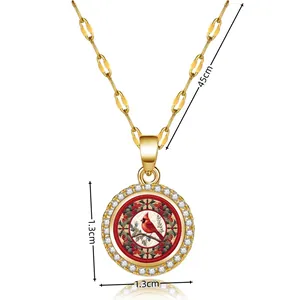Rotating cardinal bird necklace in gold with zircon circle and 45cm chain length