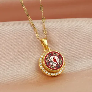 Golden necklace with cardinal bird pendant and rotating zircon inlay on champagne satin