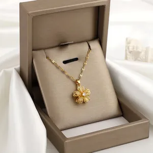 Drehbare Katzenaugen-Blumenkette aus vergoldetem Kupfer mit Zirkon in einer Geschenkbox