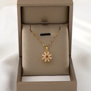 Roterende zonnebloem hanger ketting in goud met zirkoonstenen en sieraden geschenkdoos
