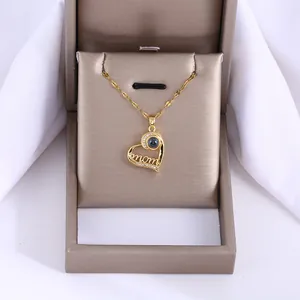 Collana con ciondolo a cuore dorato con lettere MOM e zirconi in confezione regalo
