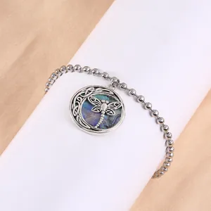 Bracciale a sfere d'argento con pendente libellula e inserto in conchiglia di abalone