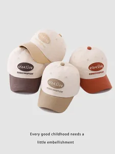 Detailed embroidery patch with creative lettering on these colorful kids baseball caps