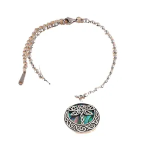 Silver bead chain bracelet featuring a dragonfly pendant with iridescent abalone shell