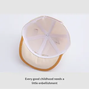 Detail of baby baseball cap interior with reinforced seams and breathable sweatband