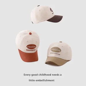 Kids color-block baseball caps with creative embroidery in beige, coffee, and khaki