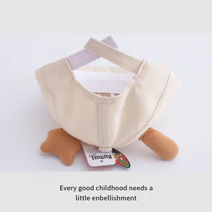 Detail view of cotton sun hat with plush brown ears and adjustable purple Velcro strap