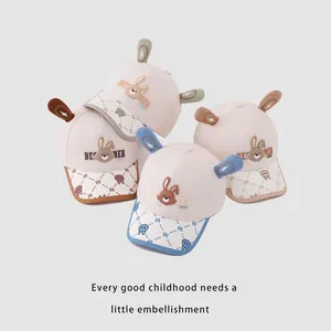Cute baby baseball caps with 3D bunny ears in soft cream, blue, and green colors