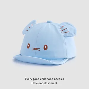 Detail of light blue baby baseball cap with 3D animal ears and cute cat embroidery