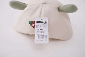 Detail view of cotton baby baseball cap showing back metal buckle and brand tag