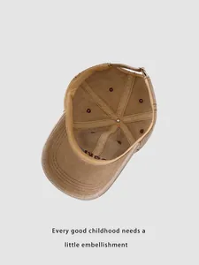 Inside view of washed canvas baseball cap showing stitching and reinforced seams