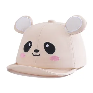 Detail of baby baseball cap featuring cute panda embroidery and 3D ears on cotton fabric
