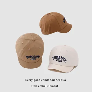Three vintage short brim baseball caps in brown and khaki with romantic embroidery