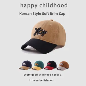 Detail of Korean style soft brim kids' baseball cap with YOY towel embroidery