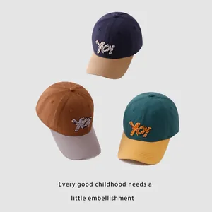 Kids vintage baseball caps with YO! embroidery and stylish color-block canvas design