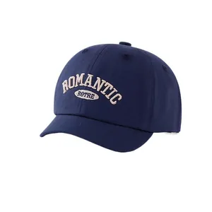 Dark blue cotton baseball cap for kids featuring white Romantic embroidery on front