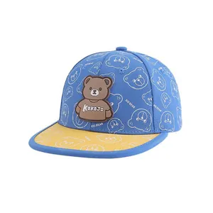 Kids baseball cap featuring cartoon bear design in bright blue and yellow contrast