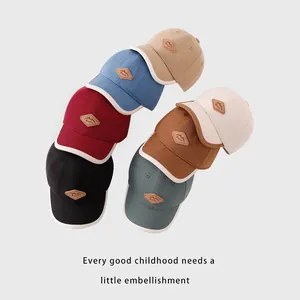 Casquettes de baseball en coton pour enfants avec écusson en cuir en six couleurs
