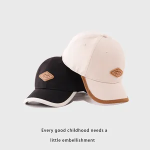 Casquettes de baseball en coton pour enfants avec patch en cuir et bordures contrastées