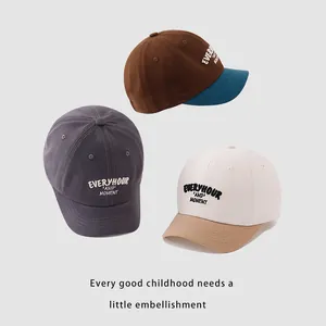 Kids baseball cap in neutral color blocks with detailed 3D embroidery and short brim