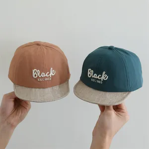 Detailed embroidery and soft brim of the Black letter baby baseball cap in two colors
