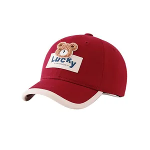Kids lucky bear baseball cap in dark red with 3D plush embroidery and white trim