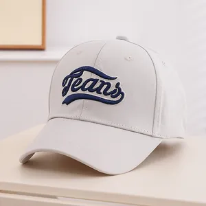 Close-up of premium cotton canvas baseball cap with 3D navy blue Jeans embroidery