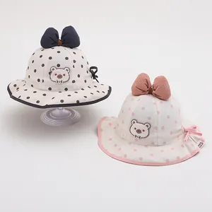 Polka dot sun hat for baby girls with cute bear patch and large decorative bow