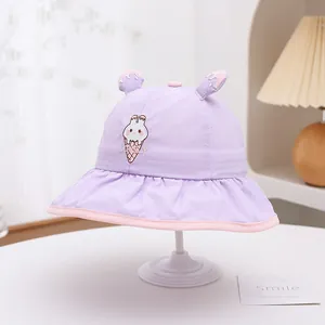 Detail of baby sun hat featuring rabbit ice cream embroidery and 3D decorative ears